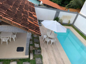 Casa na praia c/ churrasqueira e piscina.